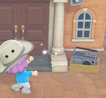 Магнитофон находится справа от входа в главное здание